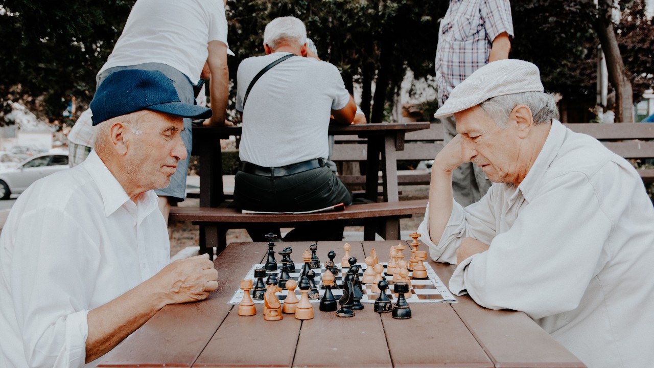 Retired men playing chess
